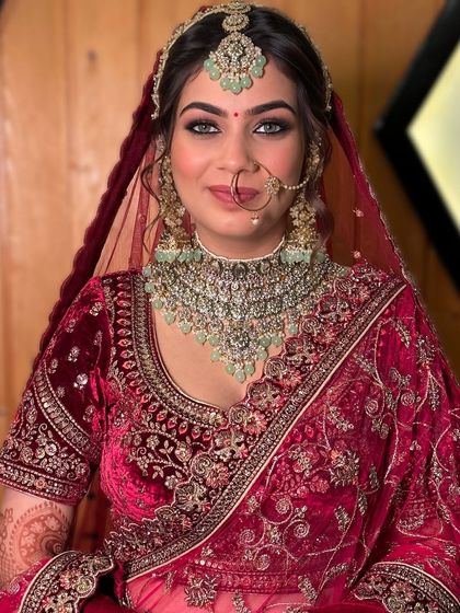 A direct look that captures the soul of this bridal creation. The makeup is carefully balanced to be glamorous yet feel authentic to the bride herself.