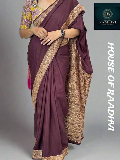 The complete look. Our dark brown Banarasi saree paired with a vibrant floral blouse and a pearl choker. This is a perfect example of how a contrasting blouse can bring a traditional saree to life.