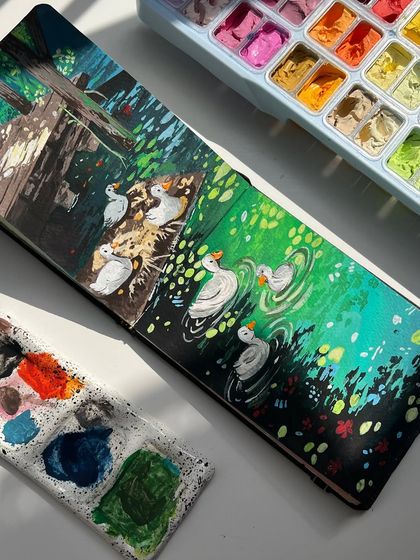 Another angle of the finished duck painting, showing the vibrant greens of the water and the cute details on the ducks.