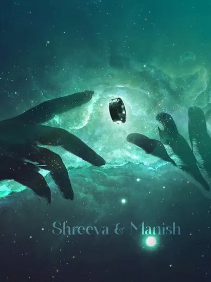A highly creative and artistic engagement ring shot, inspired by Michelangelo's "The Creation of Adam." The hands reaching for the ring against a cosmic nebula background is a unique way to announce an engagement.