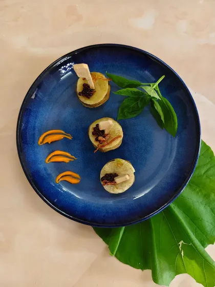 The slow-cooked richness of haleem paired with the royal sweetness of sheermal roti. This bite-sized canapé is a match made in Mughlai heaven.