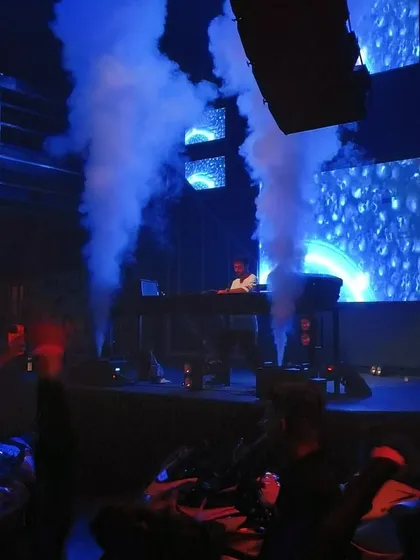 Smoke cannons firing up the stage at Sunburn. These special effects are timed perfectly with the music to create high-impact moments.