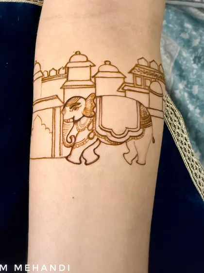 The outline of a royal elephant in front of a palace. This is the first step in creating a majestic and traditional Rajasthani-style design.