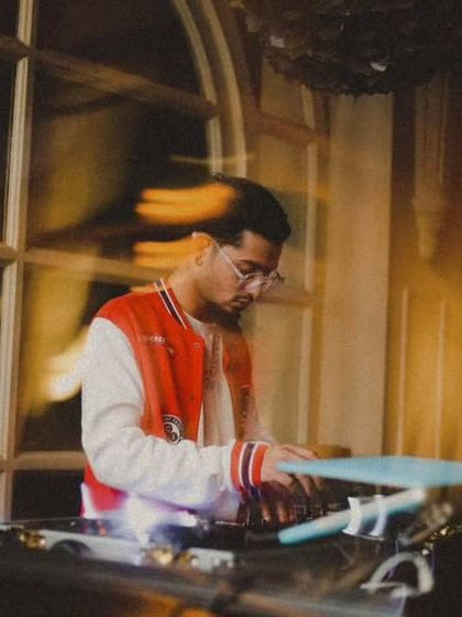 A motion blur photo that conveys the fast paced, high energy nature of my DJ sets in a club environment.