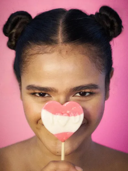 A cute and direct-to-camera look for a candy or beauty product. This kind of fresh face modeling is effective for e-commerce and print ads.