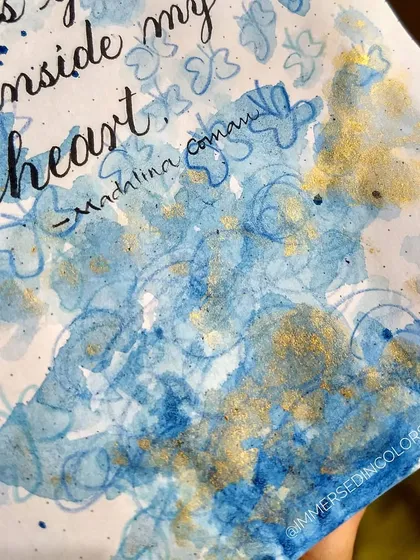 An abstract piece from my journal inspired by a beautiful quote. I used blue watercolor washes, gold splatters, and butterfly doodles to create a dreamy, ethereal feel around the calligraphy.