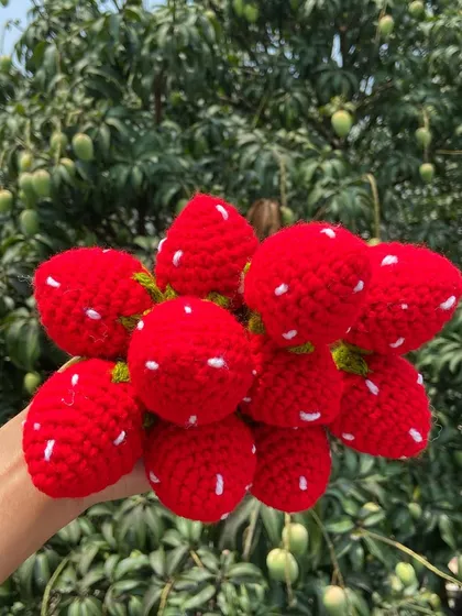 A handful of my plump and sweet crochet strawberries.