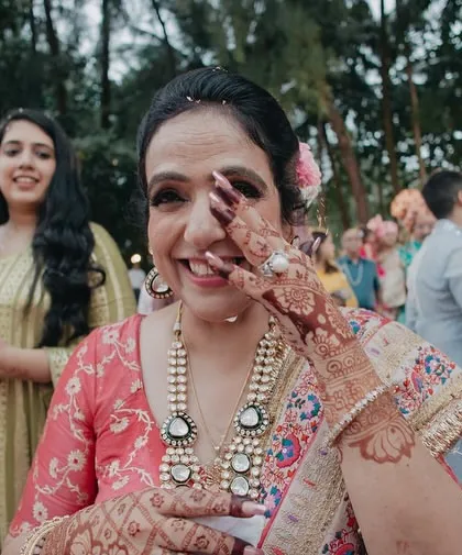 A guest wiping away a happy tear during the ceremony. Capturing the raw emotions of family and friends is a key part of our storytelling approach.