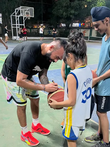 An inspiring moment as India's top 3v3 player, Dhruv Barman, signs a basketball for one of our young athletes. We love creating these unforgettable experiences that motivate the next generation.
