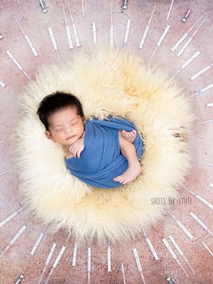 This powerful image represents the long and difficult journey of IVF. Each needle is a symbol of hope, perseverance, and a mother's incredible strength. This baby is a miracle.