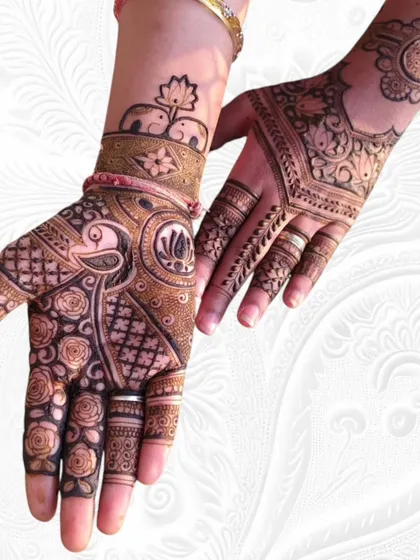 This Teej design shows a full, heavy pattern on one hand and a lighter, complementary design on the other.