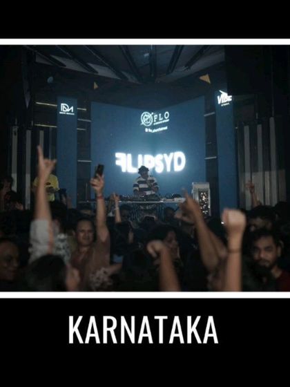 The crowd in Karnataka with their hands up. It's moments like these that make all the travel and hard work worth it.