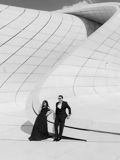 A moment of quiet grandeur in Baku, Azerbaijan. I love using dramatic architecture and monochrome tones to create timeless, high-fashion portraits that feel like a still from a classic film. This shows how a destination pre-wedding shoot can be both epic and deeply personal.