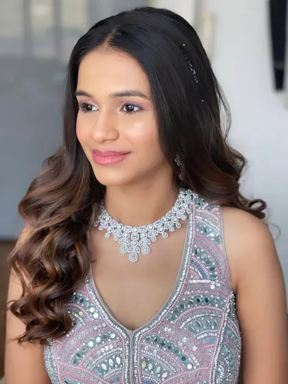 A portrait of the Roka bride, her hair simple, elegant, and with a hint of sparkle.