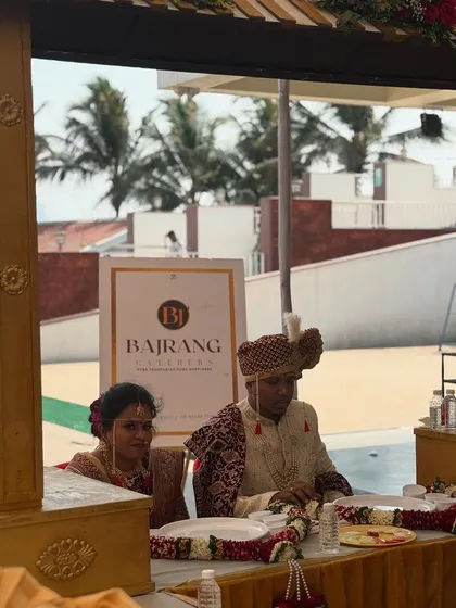 It is an honor to be a part of such special moments. Here you can see my branding in the background as the happy couple enjoys their wedding meal.