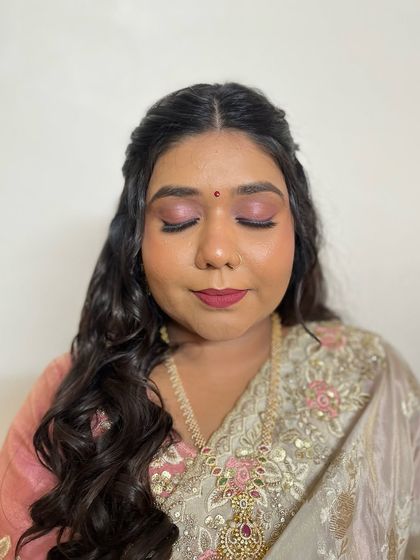 A detailed close-up of the eye makeup, showing the soft, blended hues that make this look so special.