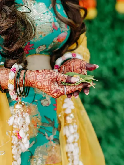 The rich color of the henna stain is beautifully captured in this candid shot.