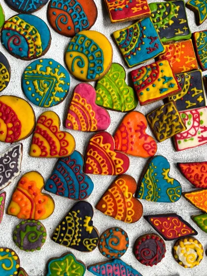 I love creating custom treats for special events, like these colourful henna-designed sugar cookies for a mehendi function. These royal icing cookies can be tailored to match your event's theme and colours.