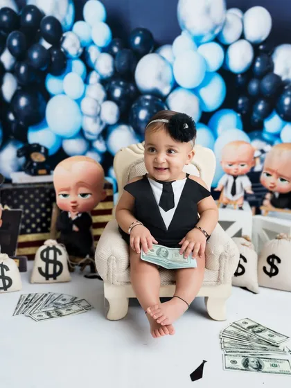 Sitting pretty on her executive chair. This little girl is rocking her "Boss Baby" themed session.