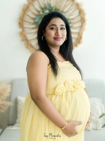 A classic portrait pose in our boho setting, this image is simple, beautiful, and focuses on the mother's serene confidence.
