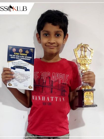 Another shot of Sai Kamal Raj with his certificate and trophy. His impressive score of 6 points in 7 rounds shows the effectiveness of consistent practice and expert chess coaching.