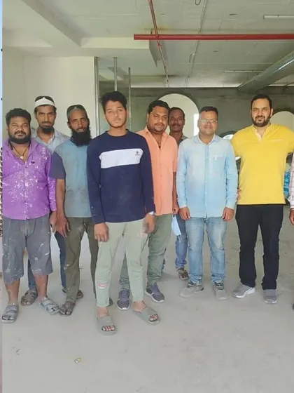 This is the incredible team of workers who helped bring our vision to life. From laying bricks to building dreams, their hard work is the foundation of Skadoosh.