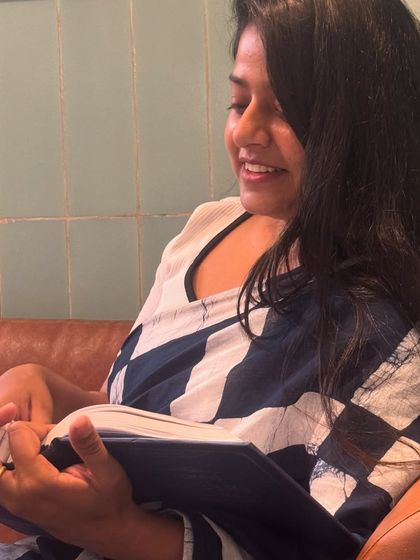 Another shot of me engrossed in my reading. The pursuit of knowledge in law is endless, and it is what gives me the edge.