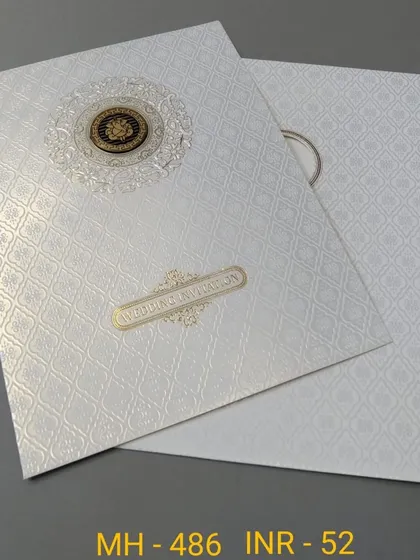 This white invitation features a textured background and a simple gold nameplate. The design is clean, modern, and budget-friendly.
