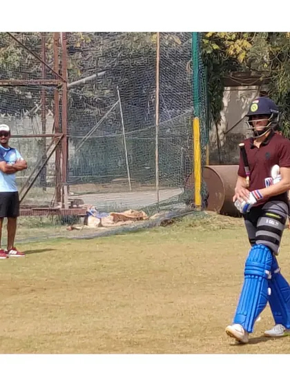 Here you can see Shubman Gill walking off after a net session while I watch on. It's a great learning experience for our young players to see the discipline of elite cricketers up close.