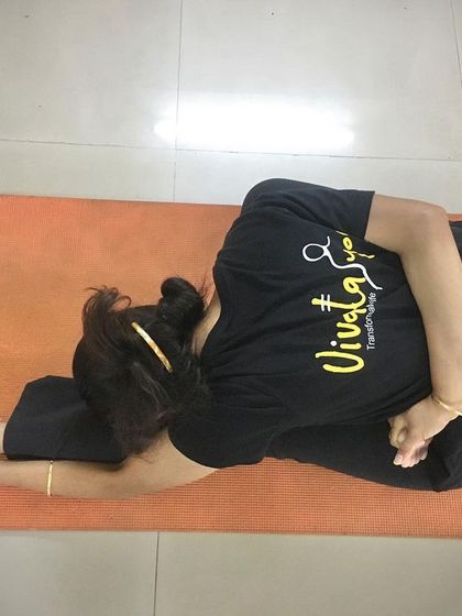 Ardha Baddha Padmottanasana, a forward bend with one foot in half lotus. This pose has a powerful effect on the liver and spleen, helping to improve metabolism and purify the blood.
