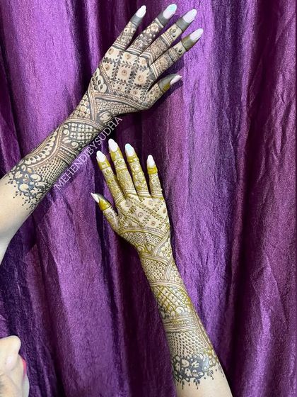 The back of the hands for an engagement, featuring a clean and elegant geometric pattern.