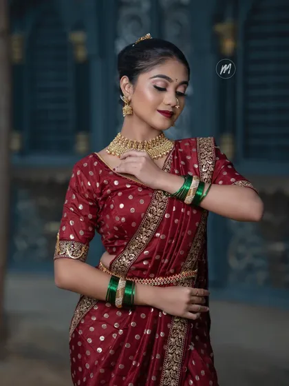 A close-up of the makeup and hairstyle that complements the Nauvari saree.