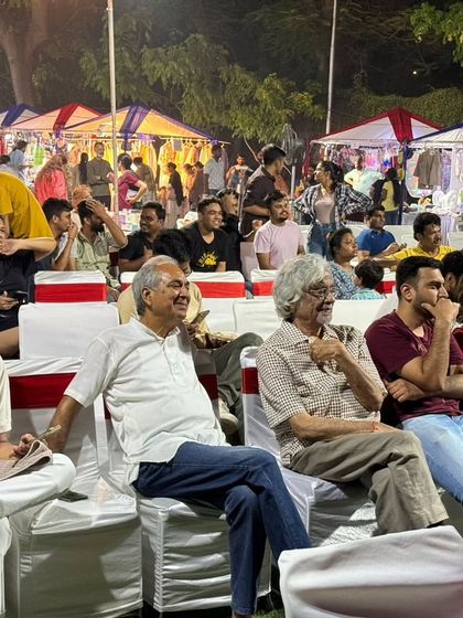 Visitors enjoying a live performance at one of our outdoor events. Creating a festive environment encourages people to stay longer and explore more.