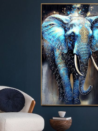 This majestic blue elephant crystal glass painting is designed to be a showstopper. The deep blue tones are highlighted with sparkling crystals that create a celestial effect, bringing a sense of grandeur and artistry to your wall.