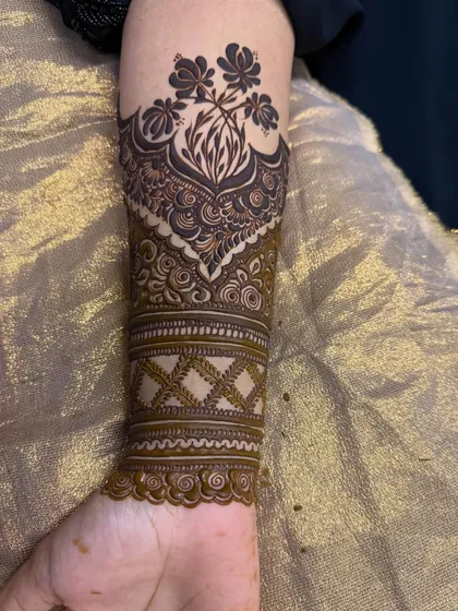 Another angle of the forearm cuff design, highlighting the intricate details.