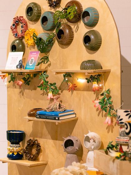 A creative display of wall planters and other decorative items from Priyanka Subramanian's garden-inspired collection.
