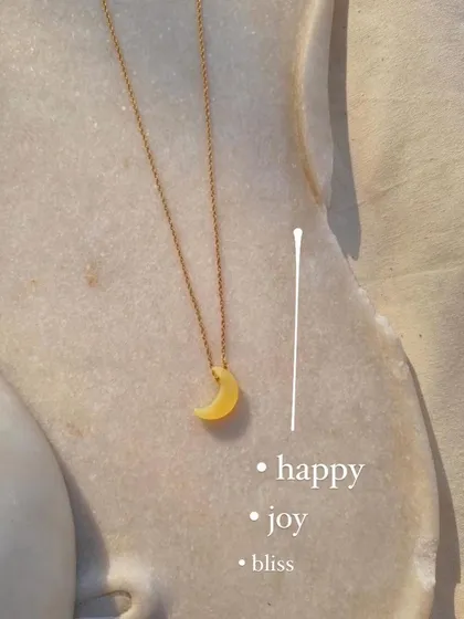 A closer look at the yellow opal Luna pendant. I associate this stone with happiness, joy, and bliss, making it a perfect charm to lighten your soul.