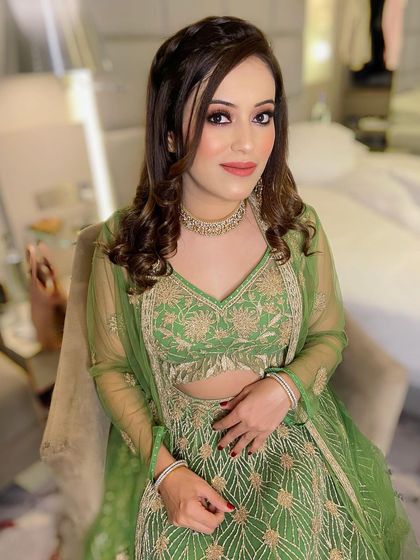 A soft yet glamorous look for this beauty in green. I used warm, earthy tones on her eyes and a nude lip to create a look that is both elegant and modern.