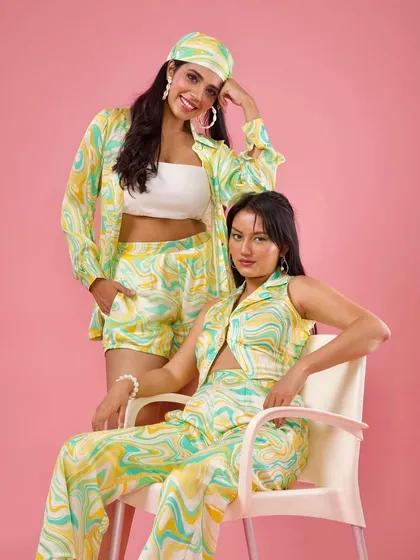 A bright and sunny look for Raki Designs. The makeup is fresh and dewy to match the summery yellow and green outfits.