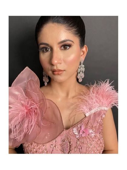 A close-up of the delicate details on our pink party gown. Perfect for a cocktail or engagement look.