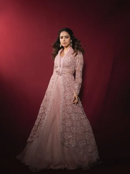 This dreamy pastel lehenga with a delicately embroidered jacket is a look I created for Nushrratt Bharuccha. It's a perfect example of modern indo-western styling for a sangeet or daytime wedding event.
