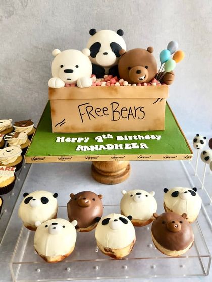How cute are the We Bare Bears? This dessert table was a joy to create, with a "Free Bears" box cake and adorable matching donuts, cupcakes, and cake pops of Grizz, Panda, and Ice Bear.