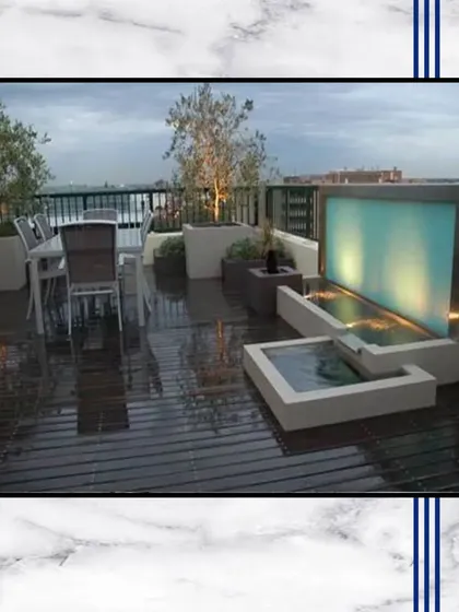 A rooftop terrace featuring a modern water feature. The gentle sound of flowing water adds a sense of tranquility, turning your balcony into a peaceful sanctuary.