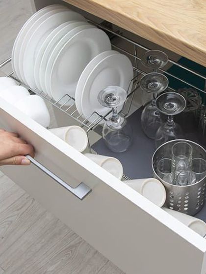 Clutter in the kitchen wastes time. This guide provides six unbreakable rules for organizing and decluttering your kitchen without having to throw everything out.