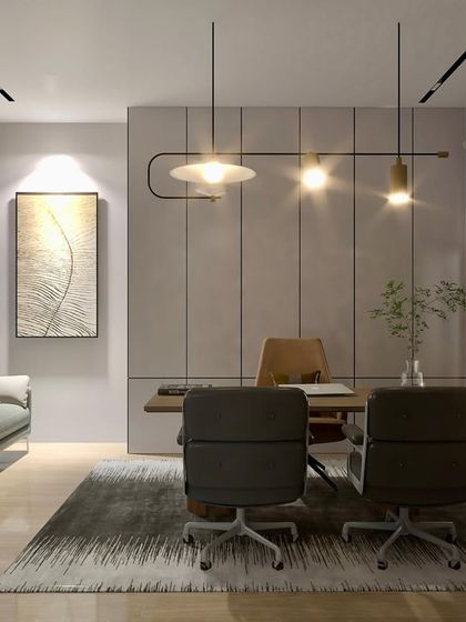 A workspace designed with precision. We balanced serene elements with warmth and professionalism to foster productivity and inspire success, using features like modern pendant lighting and comfortable seating.