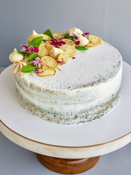 For the adventurous palate, my Lemon Basil Naked Cake is a unique treat. A light lemon and basil-infused sponge is layered with a zesty lemon curd and cream, then topped with candied lemons and fresh basil. It’s an unexpectedly refreshing and aromatic dessert.