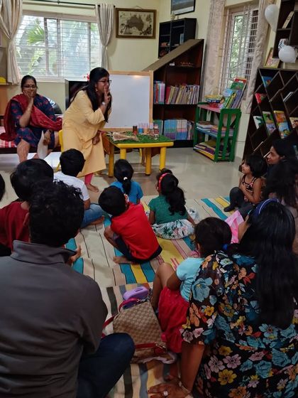 Two storytellers collaborate, creating a dynamic and interactive performance for the children.