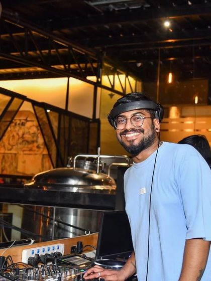 All smiles behind the decks at Shakesbierre. I play here regularly on Fridays and Saturdays, mixing good music to go with the great food and drinks.