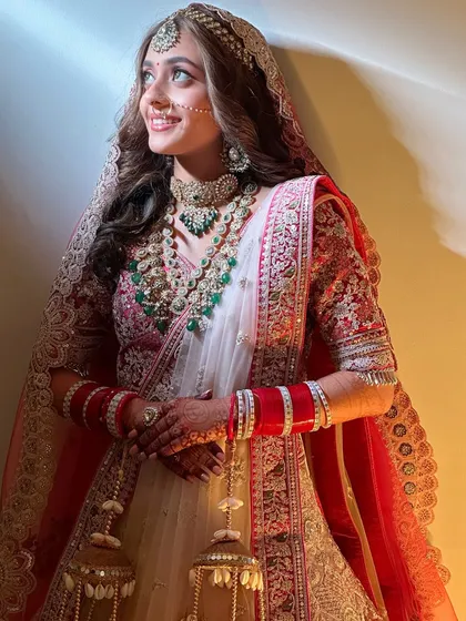 The pure joy of a bride on her wedding day is my biggest inspiration. This look captures the essence of the 'soft girl' aesthetic with a dewy finish, rosy tones, and gentle waves, creating a look that is fresh, modern, and utterly romantic.