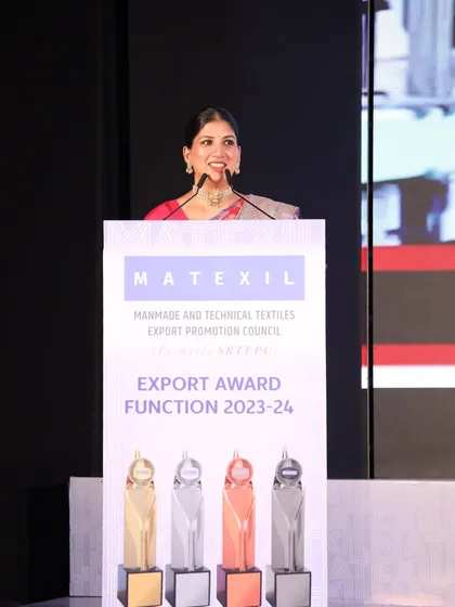 Addressing the audience at the MATEXIL Export Award Function 2023-24. I am comfortable commanding a stage and speaking to large audiences at significant industry events.